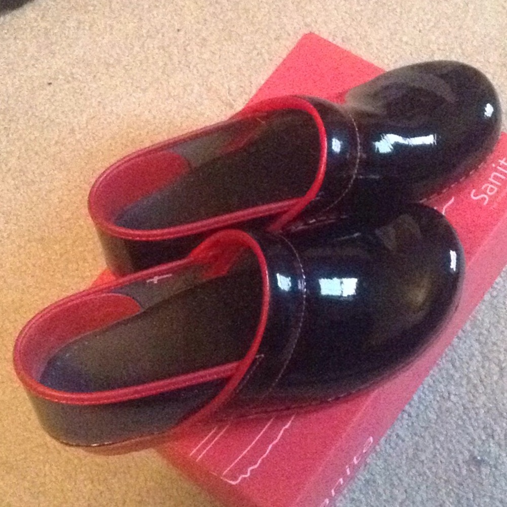 Sanita black and red clogs. New in box.